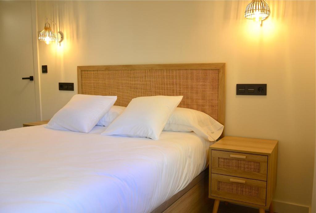 Cama o camas de una habitación en La casa de la abuela Gabina, Duruelo de la Sierra - 12 personas