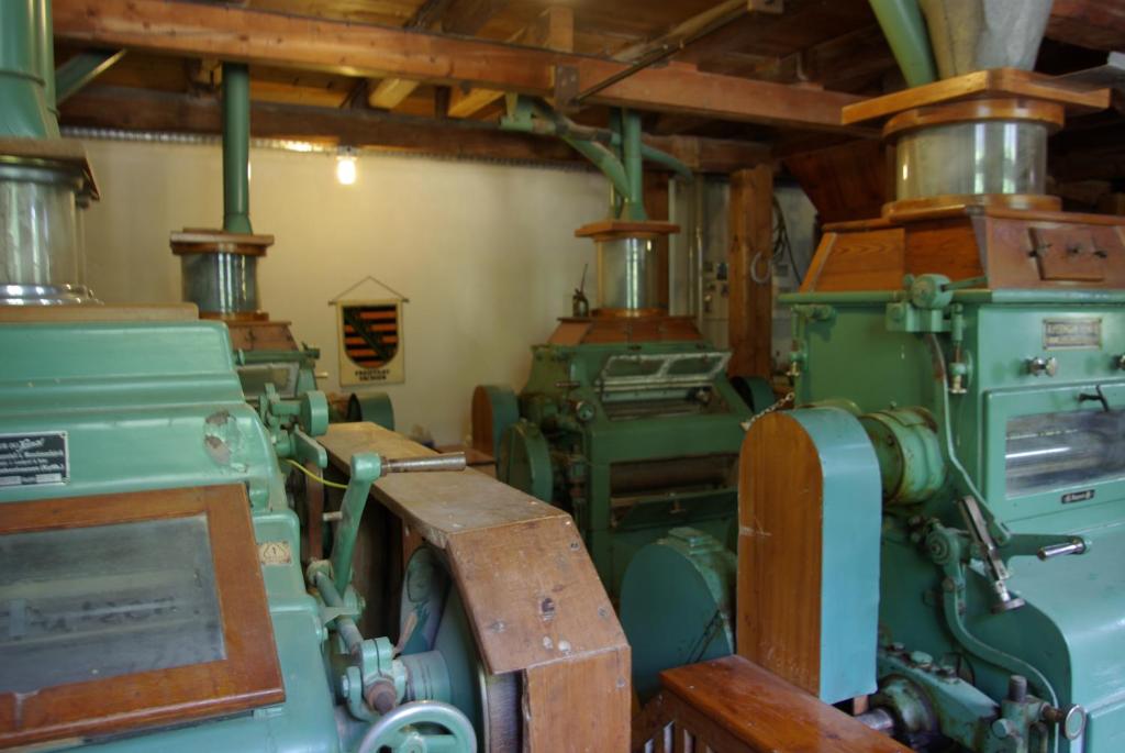 Kuchyň nebo kuchyňský kout v ubytování Hotel in der Mühle