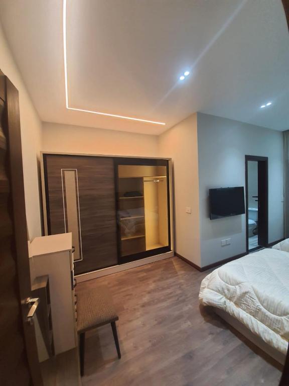 Postel nebo postele na pokoji v ubytování New Cairo rooms