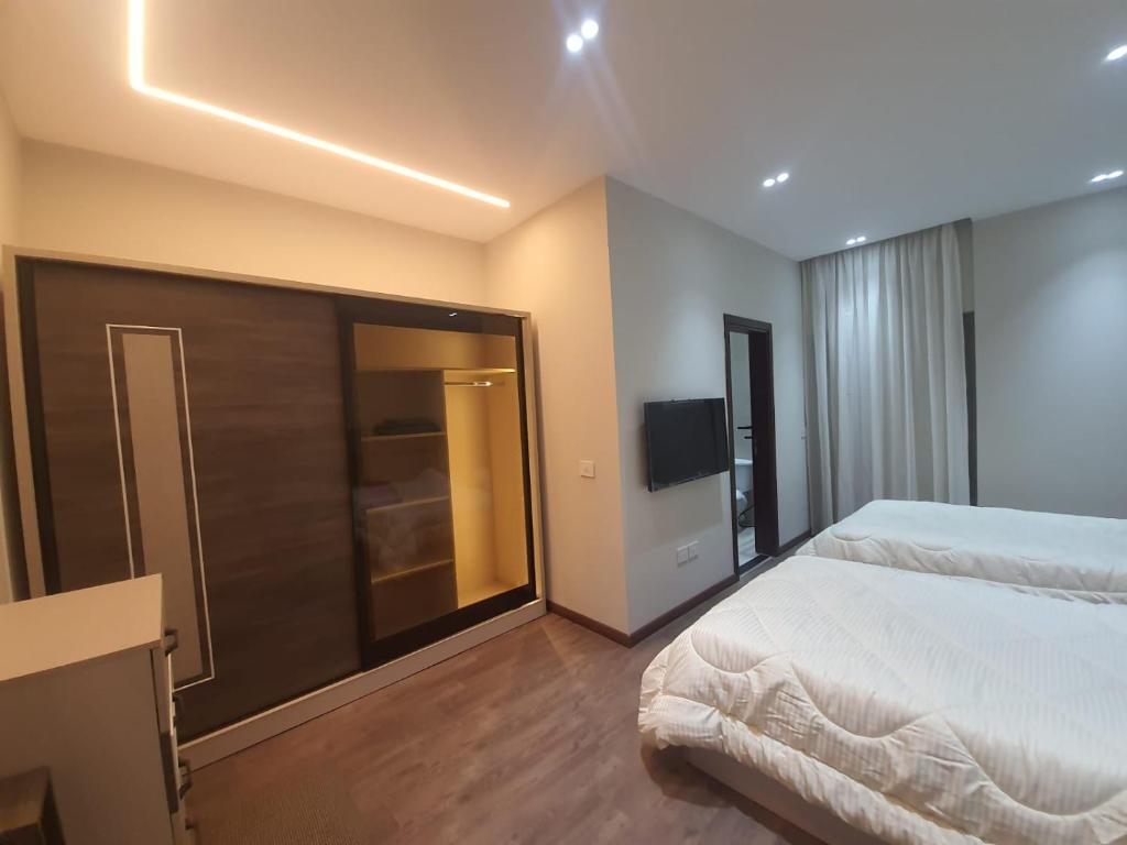 Postel nebo postele na pokoji v ubytování New Cairo rooms