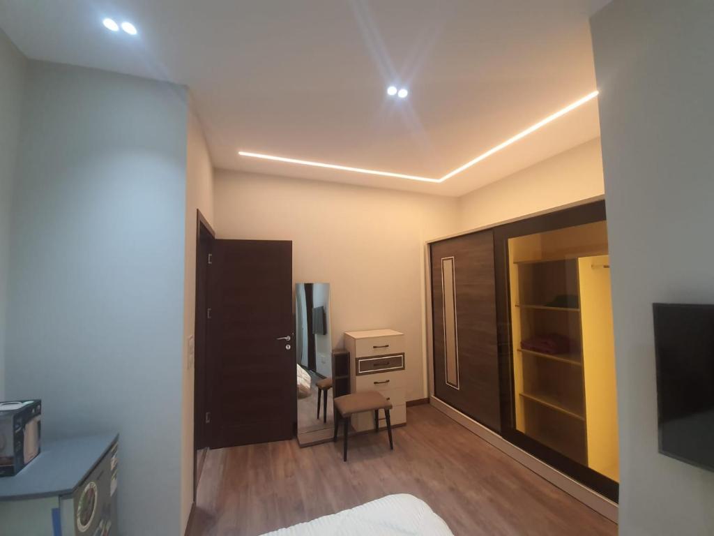 TV a/nebo společenská místnost v ubytování New Cairo rooms