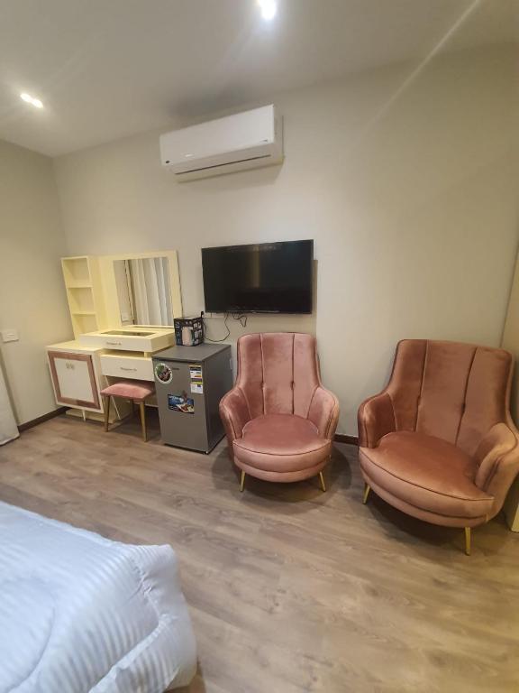 TV a/nebo společenská místnost v ubytování New Cairo rooms