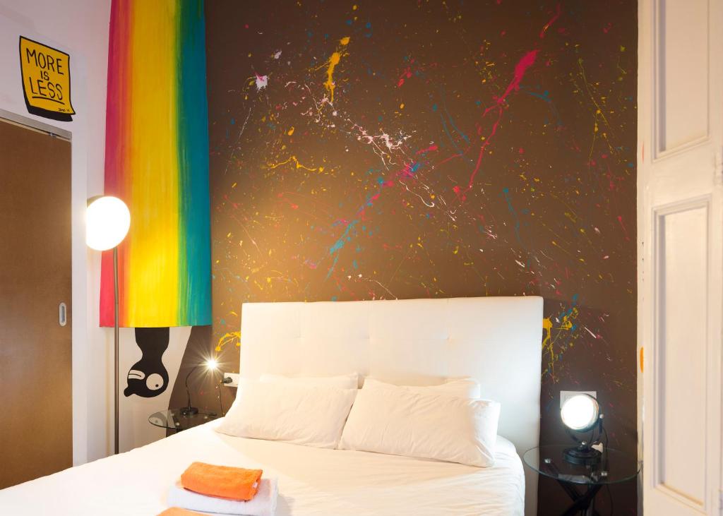 Postel nebo postele na pokoji v ubytování ZOOROOMS Boutique Guesthouse