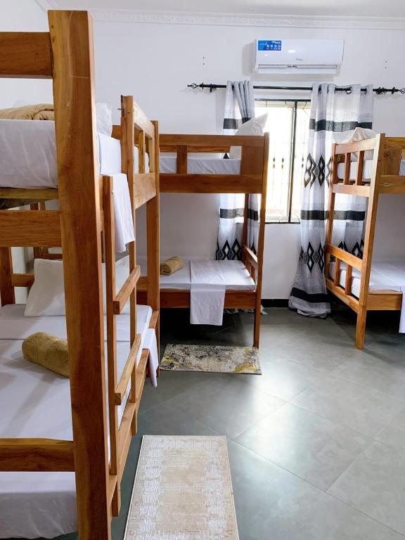 Palanda nebo palandy na pokoji v ubytování Tamu House Pajé Beach
