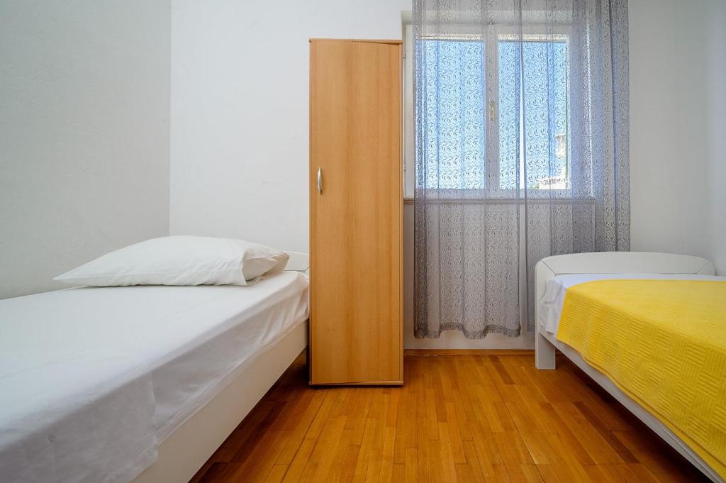 Posteľ alebo postele v izbe v ubytovaní Villa Sara by the sea in Vinisce - Ljubljeva