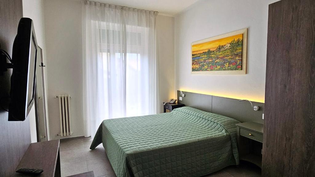 TV a/nebo společenská místnost v ubytování Hotel Marina
