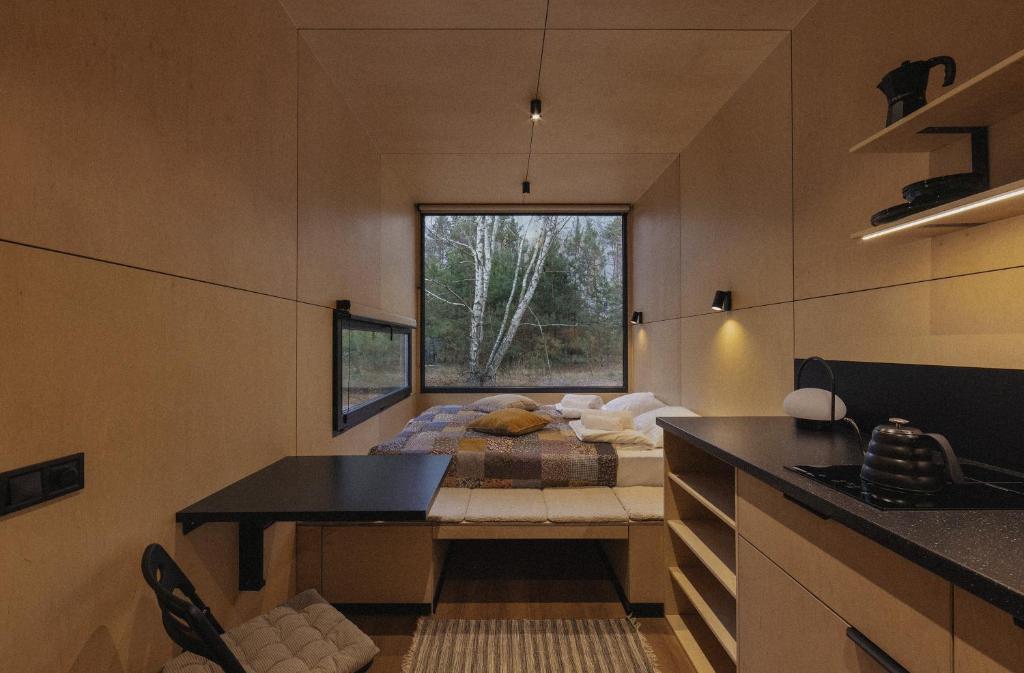 Kuchyň nebo kuchyňský kout v ubytování Swipe Scape Hotel