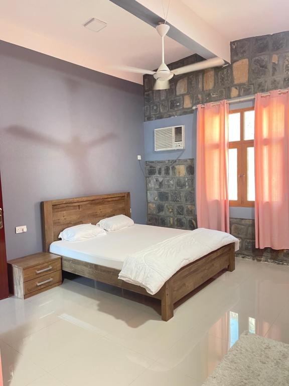 Postel nebo postele na pokoji v ubytování Jabal Shams Villa