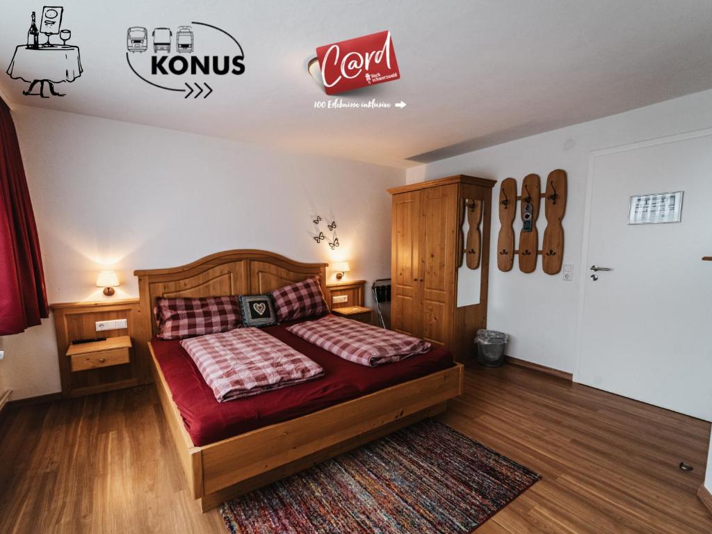 Postel nebo postele na pokoji v ubytování Forsters Schwarzwald Pension