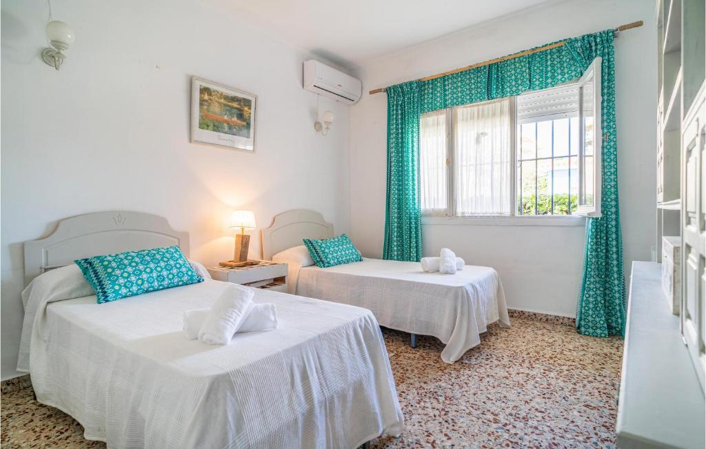 Posteľ alebo postele v izbe v ubytovaní Casa Miraflores El Palo Málaga