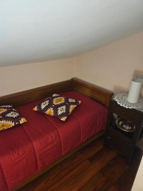Postel nebo postele na pokoji v ubytování Sassi's Loft