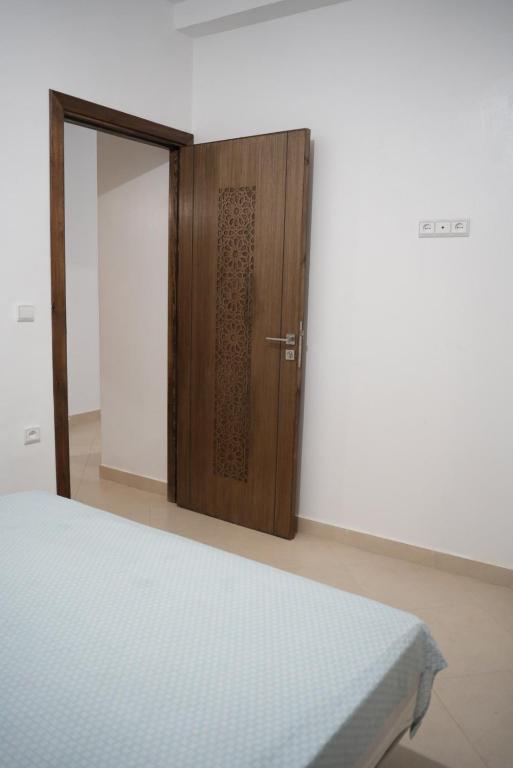Postel nebo postele na pokoji v ubytování Apartamentos Azlabech 2