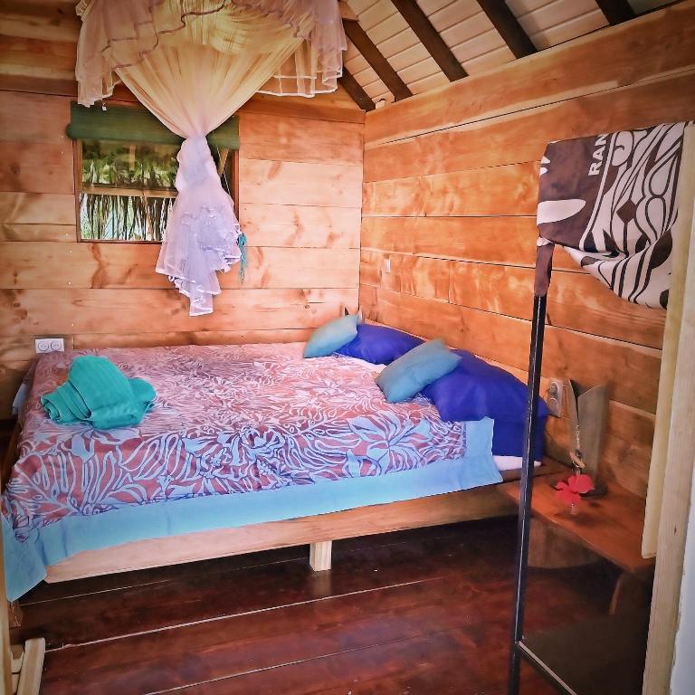 Postel nebo postele na pokoji v ubytování Sunset rooms - Auberge Polynésienne