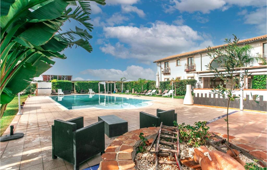 The swimming pool at or close to 4 Bedroom Stunning Home In Arenella