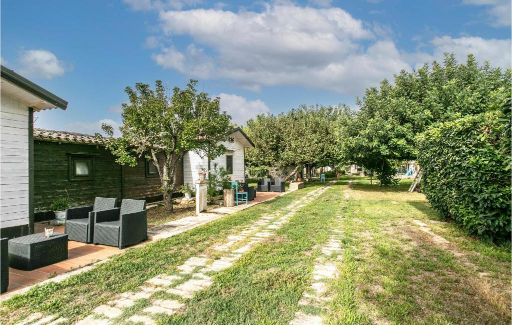 A garden outside 4 Bedroom Stunning Home In Arenella