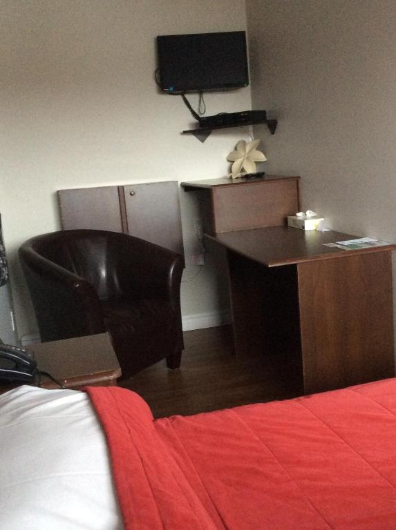 TV a/nebo společenská místnost v ubytování Miami Motel inc
