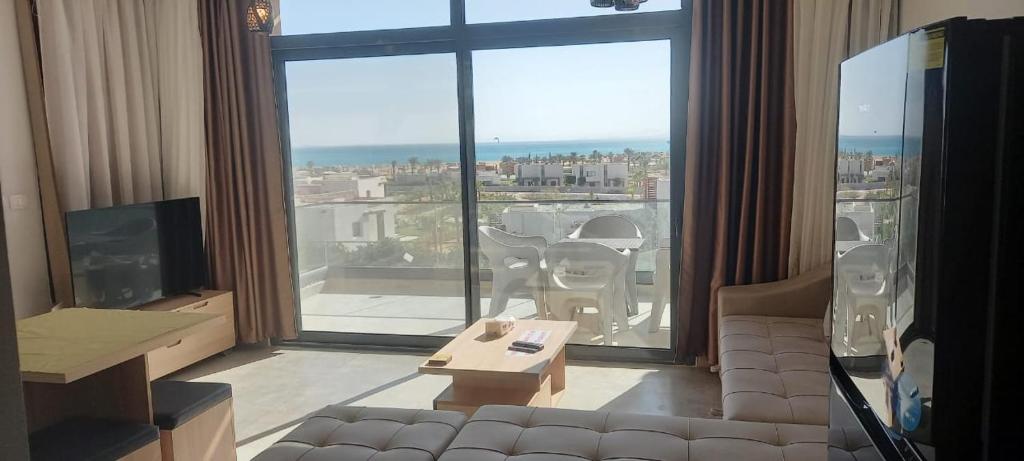 TV a/nebo společenská místnost v ubytování Mesca Chalet Soma Bay