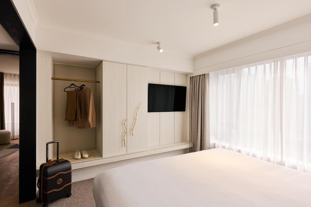 TV a/nebo společenská místnost v ubytování Adina Apartment Hotel Sydney Town Hall
