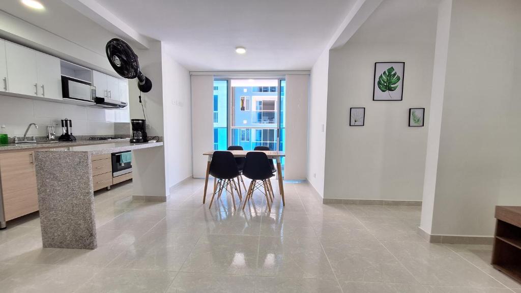 Eldhús eða eldhúskrókur á Apartamentos en Club Residencial
