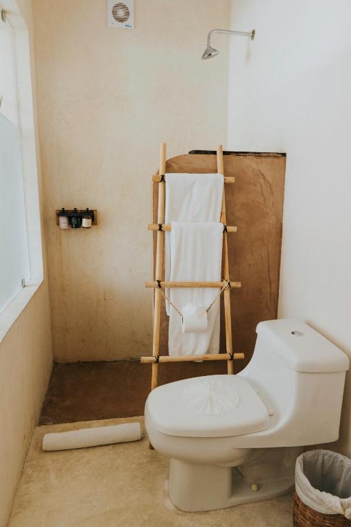 Koupelna v ubytování Koos Tulum Hotel