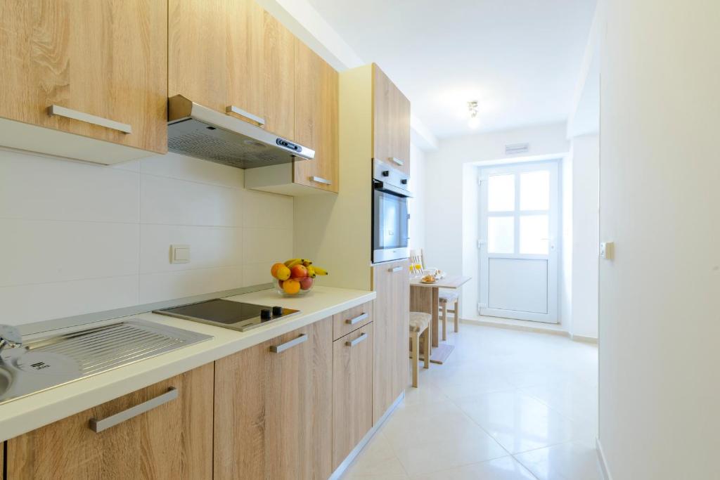 Kuchyňa alebo kuchynka v ubytovaní Imperium Apartments