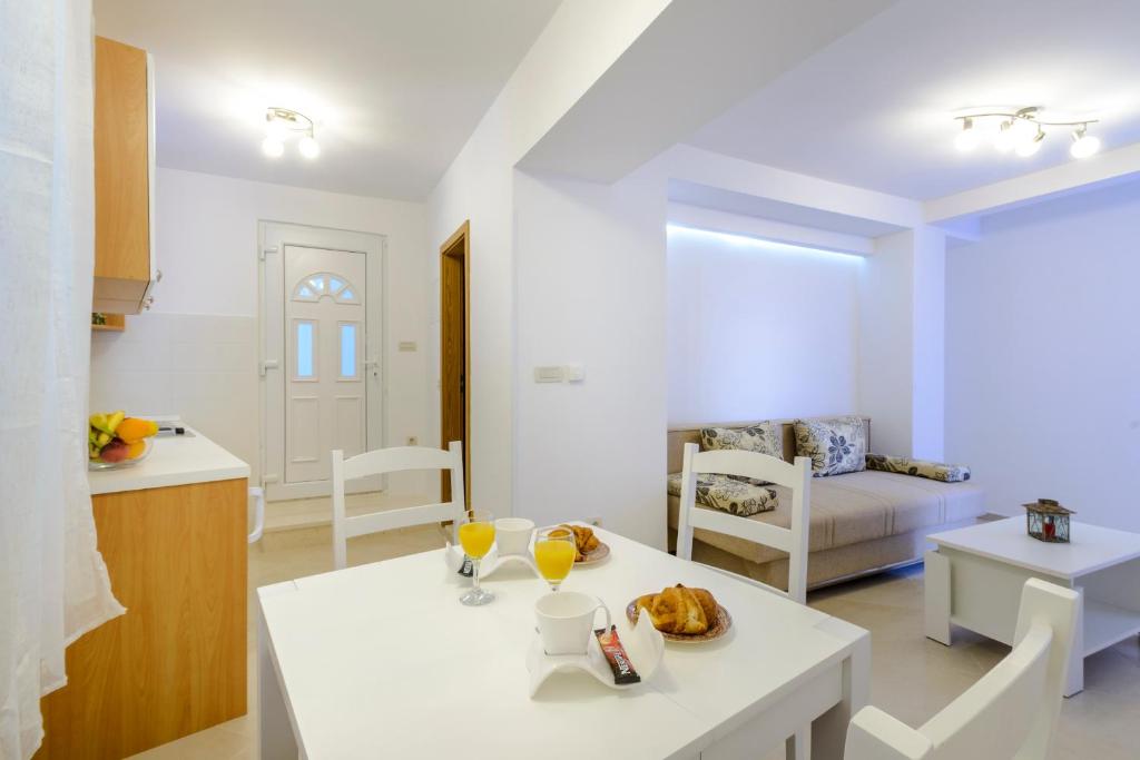 Posteľ alebo postele v izbe v ubytovaní Imperium Apartments