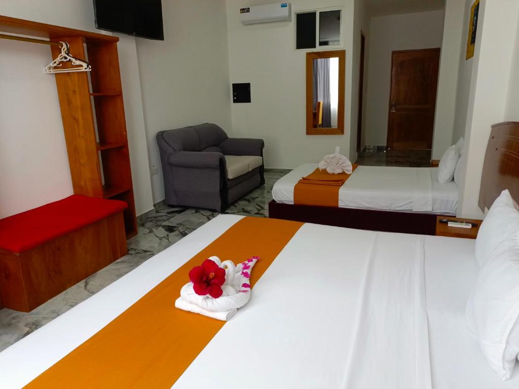 Postel nebo postele na pokoji v ubytování Patty House Galapagos