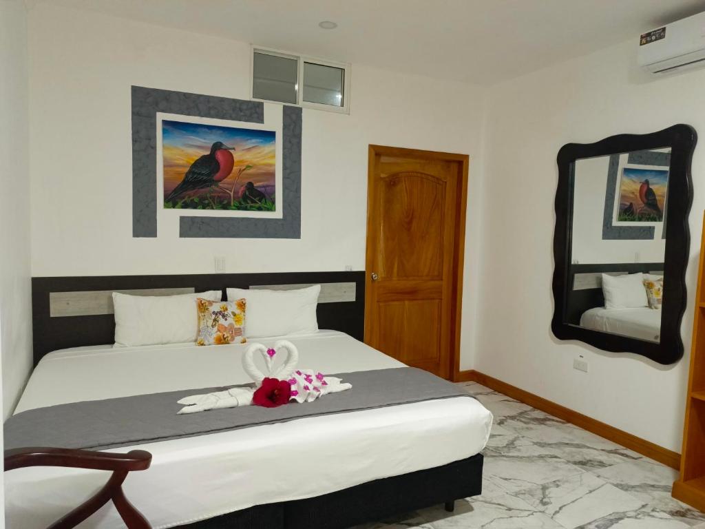Postel nebo postele na pokoji v ubytování Patty House Galapagos