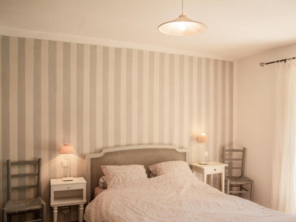 Łóżko lub łóżka w pokoju w obiekcie Villa Martinet