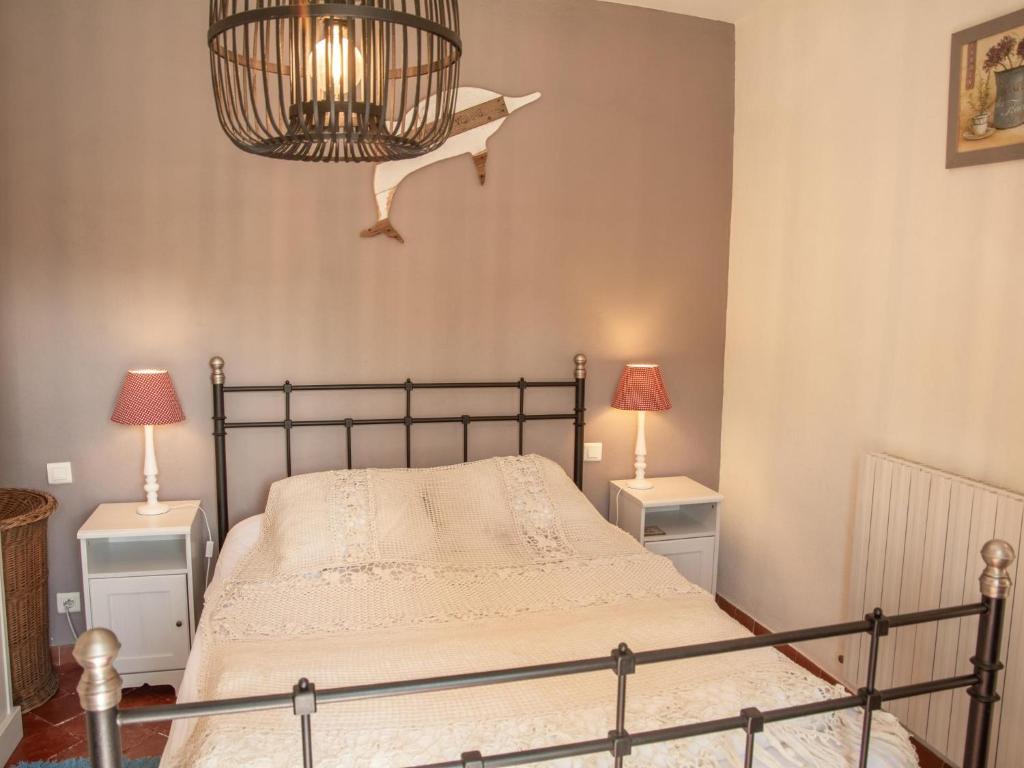 Łóżko lub łóżka w pokoju w obiekcie Villa Martinet