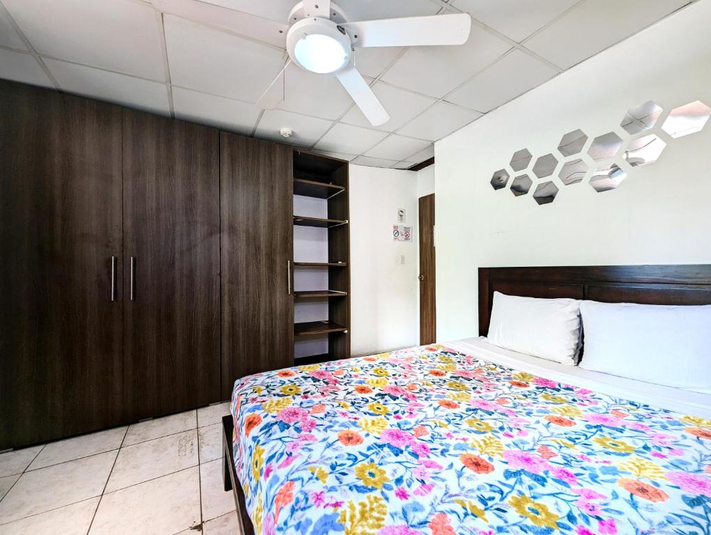 Postel nebo postele na pokoji v ubytování Hostal Yoha