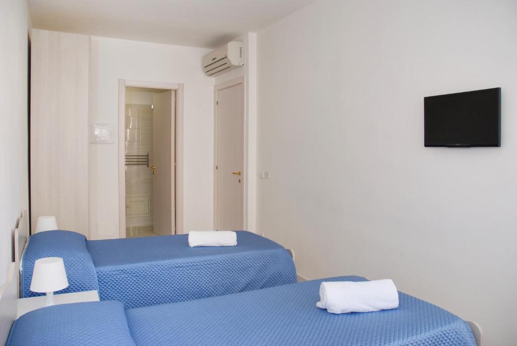 TV a/nebo společenská místnost v ubytování B&B Sikelia
