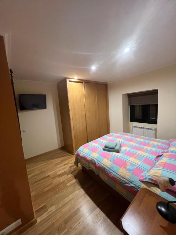 Łóżko lub łóżka w pokoju w obiekcie Villa Adilia