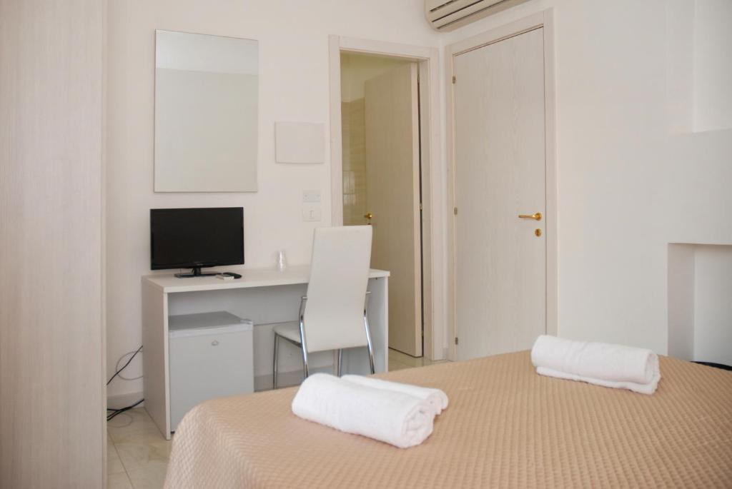 Postel nebo postele na pokoji v ubytování B&B Sikelia