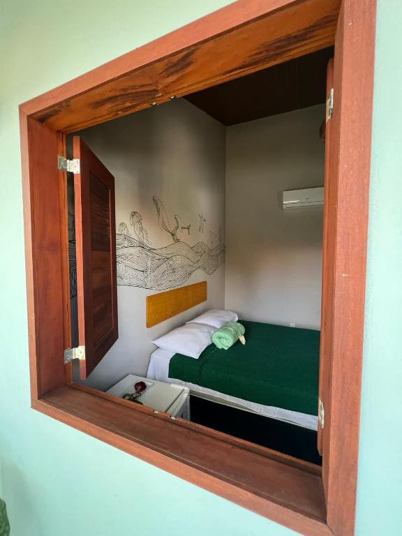 Postel nebo postele na pokoji v ubytování Recanto do cajueiro