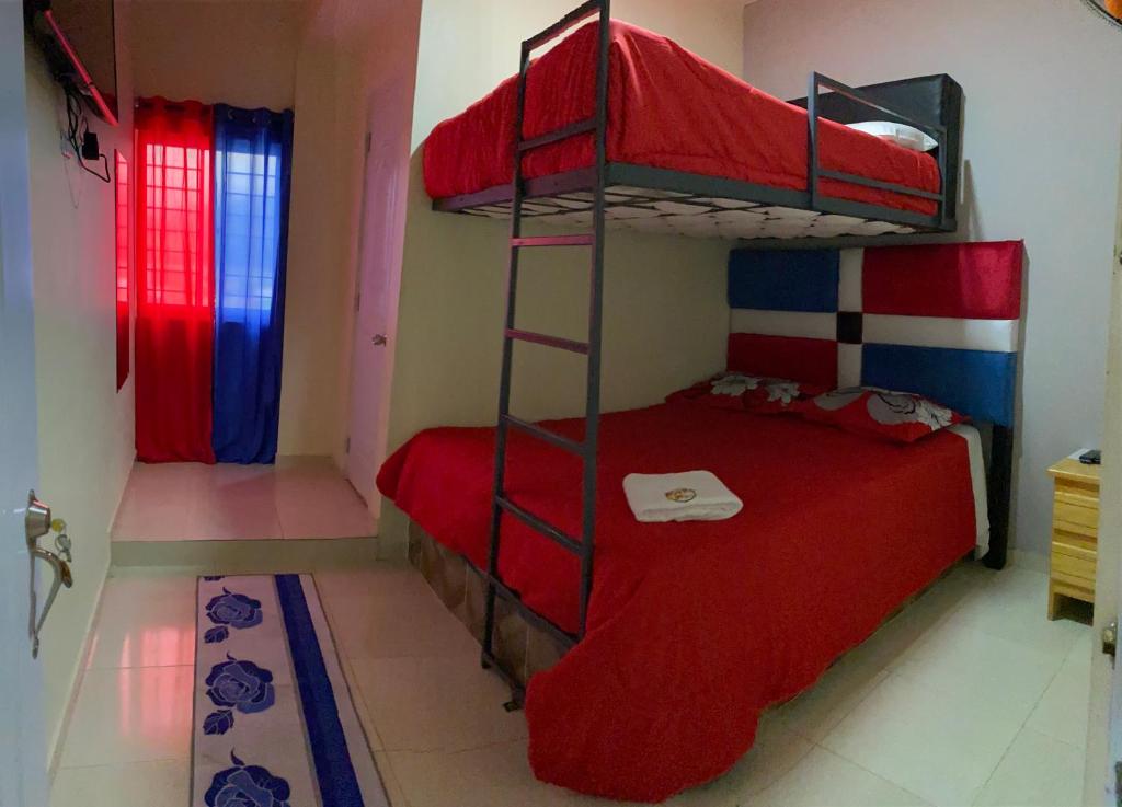 Postel nebo postele na pokoji v ubytování Hotel El Parque Constanza