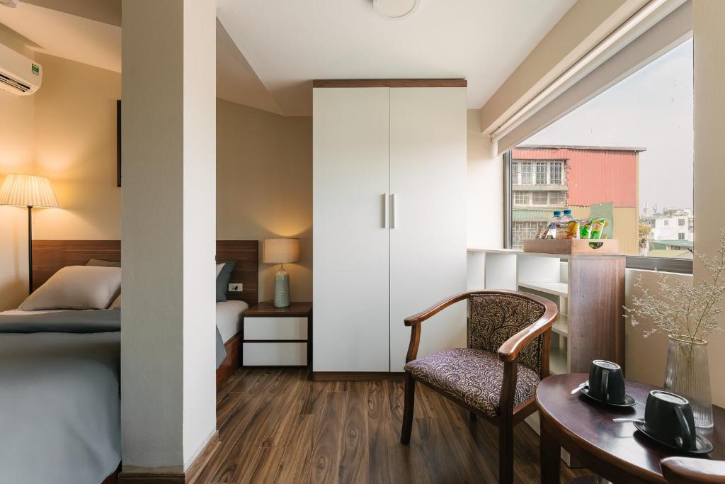 Kuchyň nebo kuchyňský kout v ubytování An Nguyen Boutique Hotel