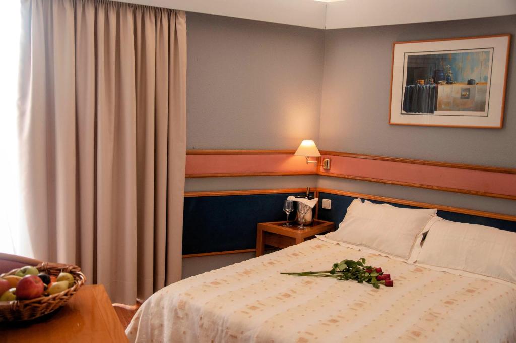 Postel nebo postele na pokoji v ubytování Hotel Samaras