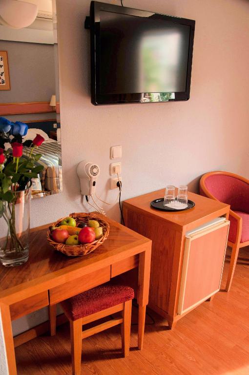 TV a/nebo společenská místnost v ubytování Hotel Samaras