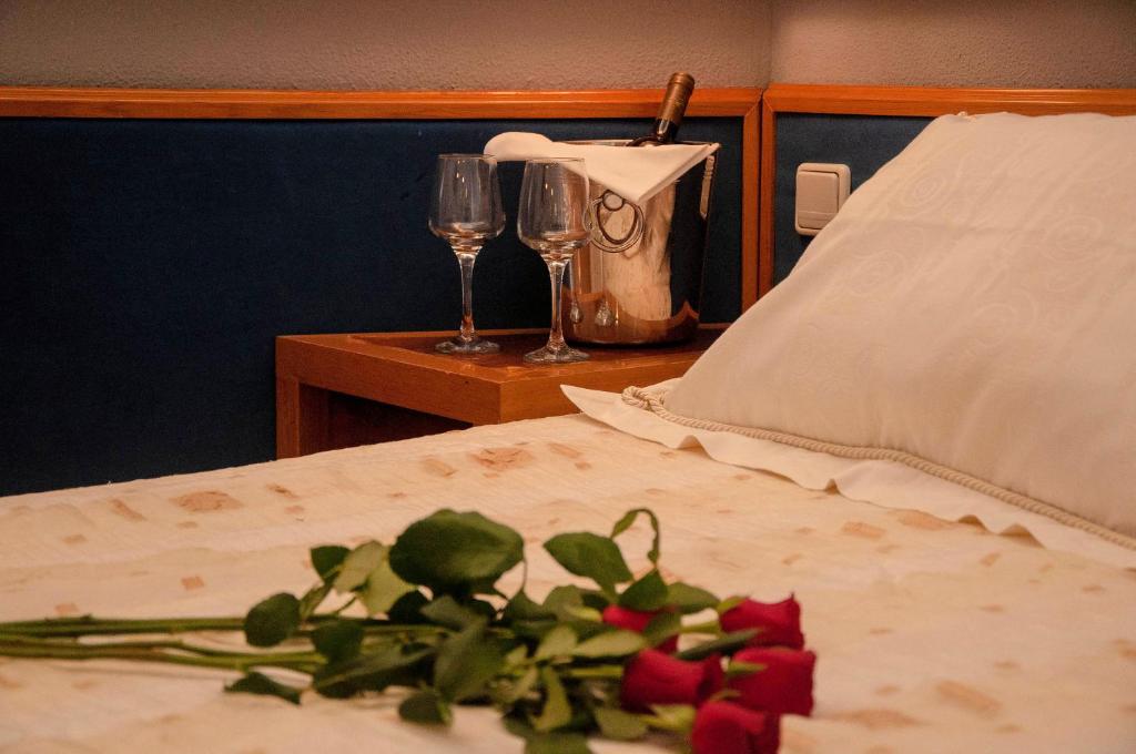 Postel nebo postele na pokoji v ubytování Hotel Samaras