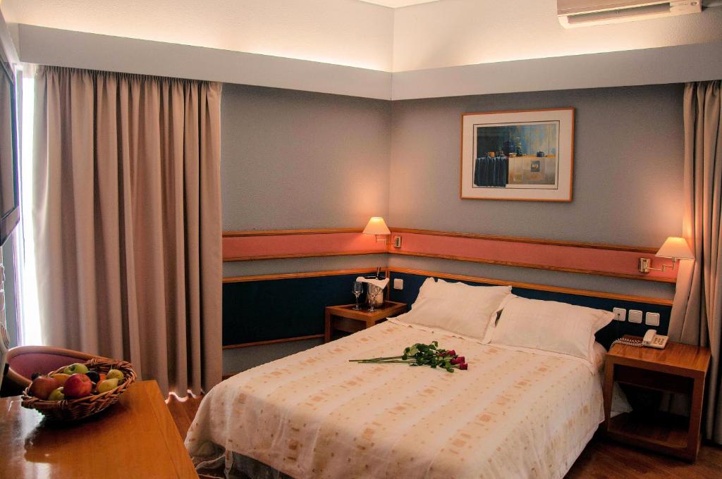 Postel nebo postele na pokoji v ubytování Hotel Samaras