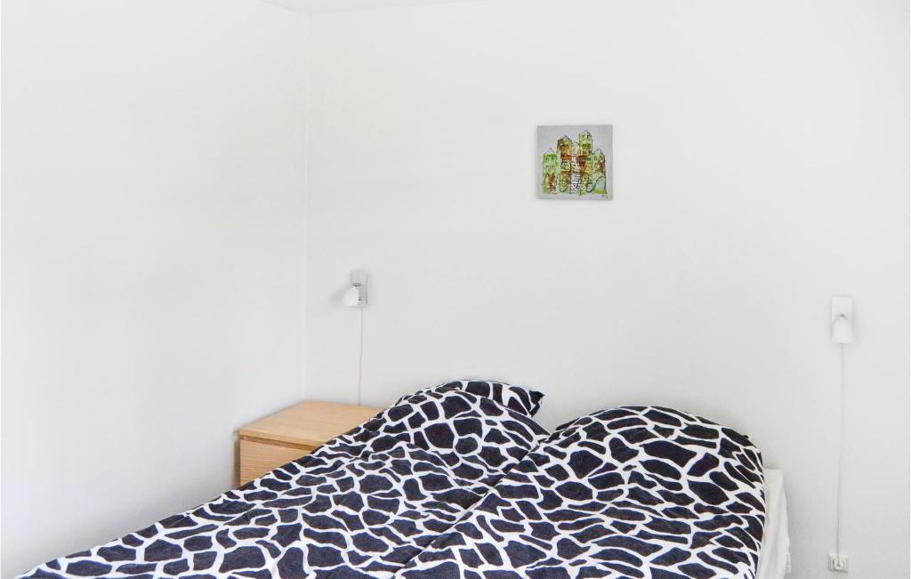 Postel nebo postele na pokoji v ubytování Holiday Home Frederikshavn 41