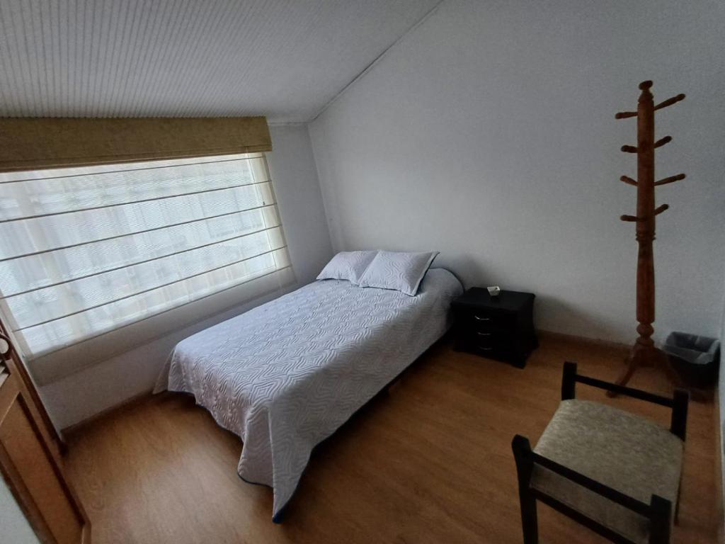 Postel nebo postele na pokoji v ubytování Casa Café & Orquídea - Hospedaje