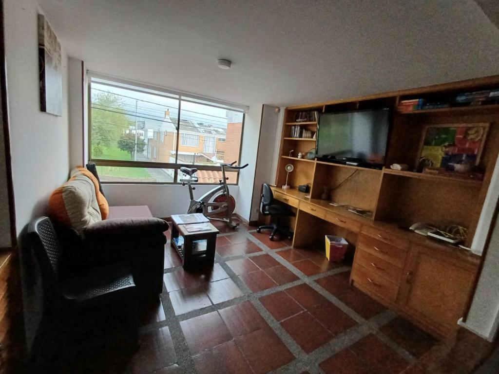 TV a/nebo společenská místnost v ubytování Casa Café & Orquídea - Hospedaje