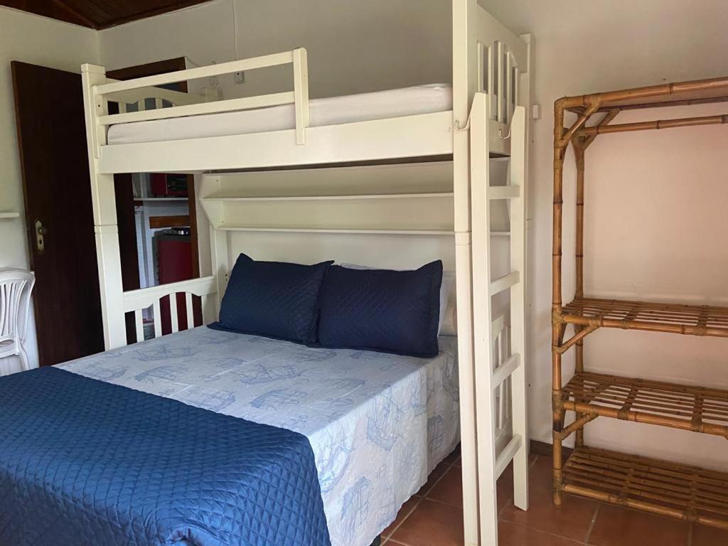 Ένα ή περισσότερα κρεβάτια σε δωμάτιο στο Suites Sete Cores