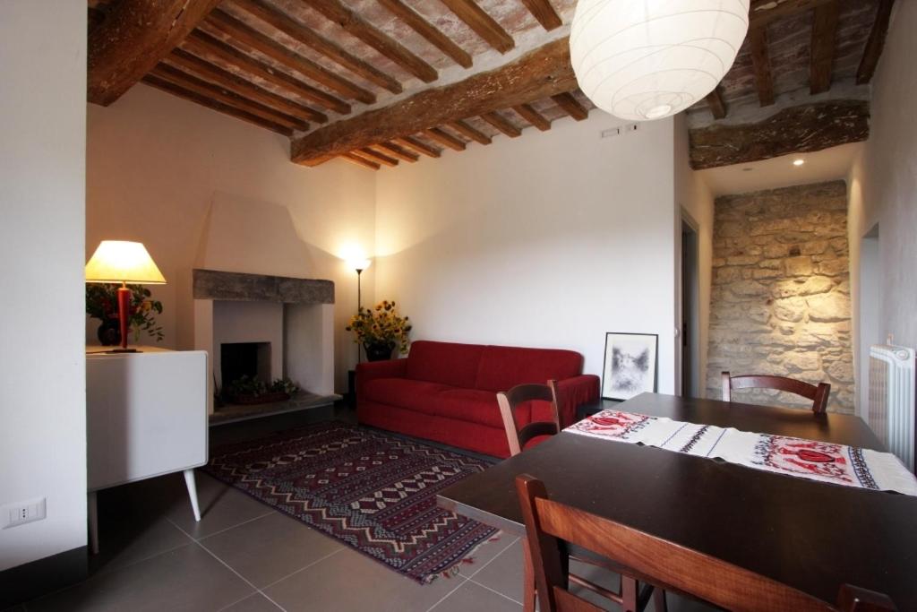 A seating area at Gli Appartamenti Di Torre Bertona