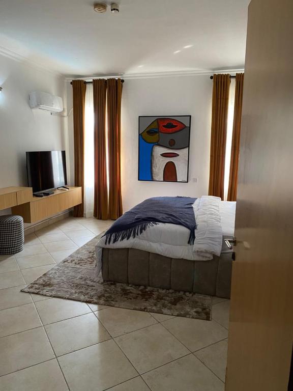 TV a/nebo společenská místnost v ubytování Enzo Apartments