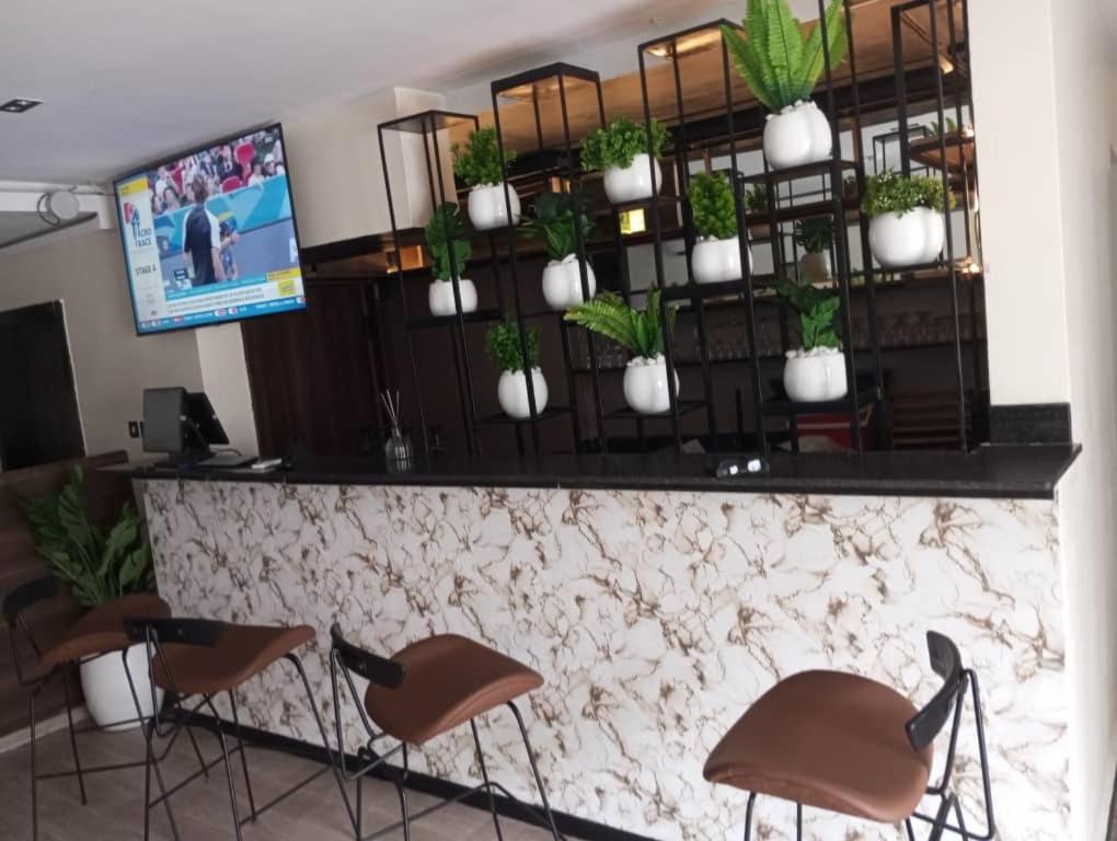 TV a/nebo společenská místnost v ubytování Enzo Apartments