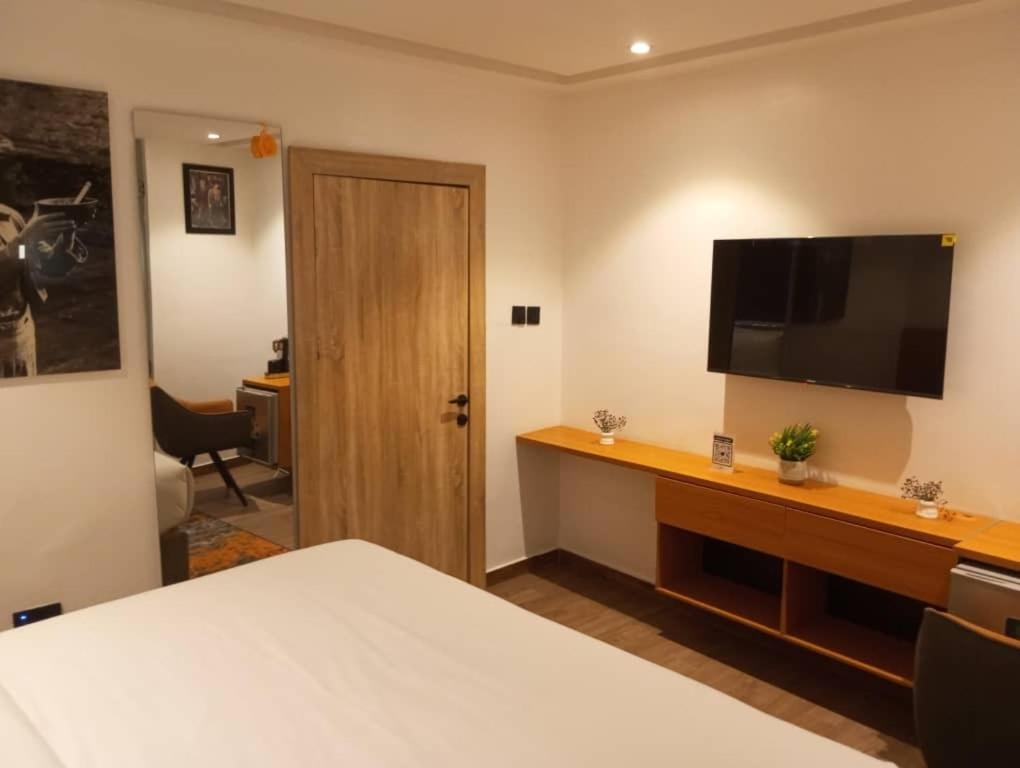 TV a/nebo společenská místnost v ubytování Enzo Apartments