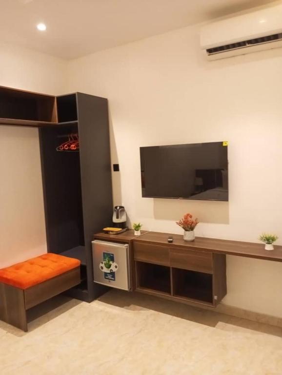 TV a/nebo společenská místnost v ubytování Enzo Apartments